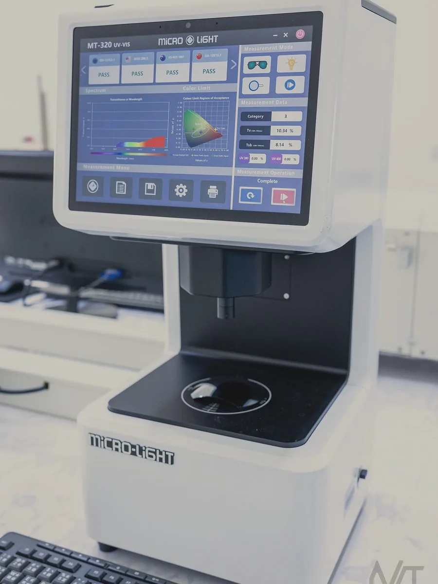 UV-VIS spectrophotometer showing a pass result against 3 eyewear standards